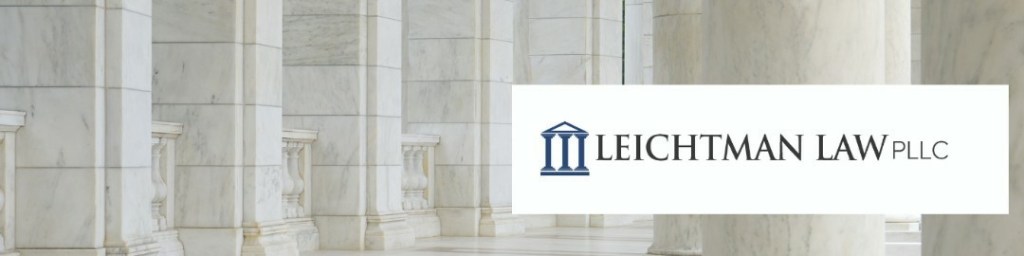 Gray and white marble columns with the banner Leicthman Law PLLC on the left 